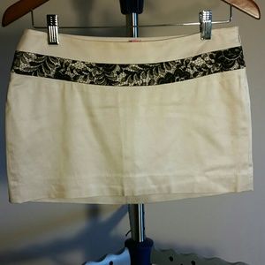 Bebe gold mini skirt